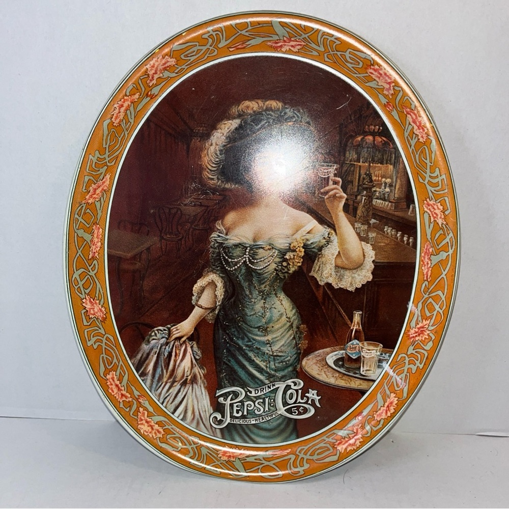 Vintage Pepsi Decorative Plate with Orange and Green Accents